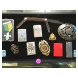 TRAY OF ZIPPO LIGHTERS, BELT BUCKLE & MORE