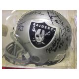 TEAM AUTOGRAPHED RAIDERS MINI HELMET, W / COA