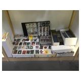 SHELF LOT OF SPORTS TRADING CARDS