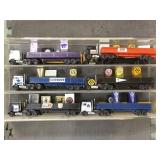 LUCITE CASE W/ SPORTS THEMED FLATBED TRUCKS