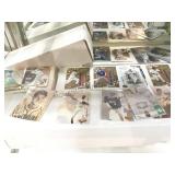 SHELF LOT OF SPORTS TRADING CARDS