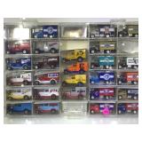 MATCHBOX BASEBALL THEMED TRUCKS IN DISPLAY CASE
