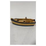 Hand made boat and ores