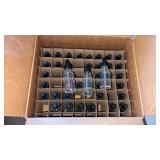 Box of glass bottles with droppers