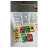 6 plastic containers to hold sports cards, and7