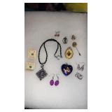 Miscellaneous lot of earrings , purple cameo