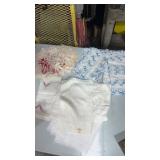 Lot of doilies table, runners, and placemats. All