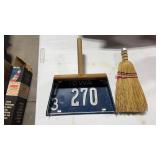 Dustpan made out of an Iowa license plate and