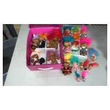Large lot of troll dolls and a case