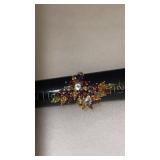 Woman's size 10  multi stone cluster ring marked