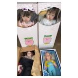 4 porcelain dolls all in original boxes