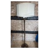 Floor lamp  brass like and shade.  Shade is a