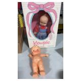 Cutie, doll inbox and a plastic cutie doll