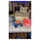 Miscellaneous lot of view masters and reel box.