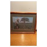 Framed and matted  print if a farmer in the field