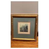 Framed and matted etching  depicting a forest