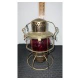 U P Adlake railroad lantern with red glass shade