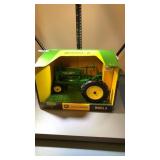 Ertl John Deere model a tractor 1/16