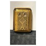 Brass vests match safe