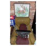 Chair , shelf and pictures