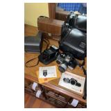 Minolta, 110 zoom SLR camera and electro flash 25