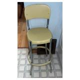 Yellow metal Costco stool without steps