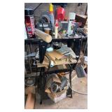 Craftsman router table with miscellaneous items