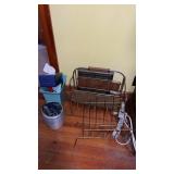 2 metal magazine racks and 2 surge protectors.