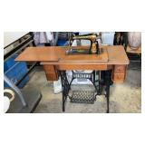 Antique Singer sewing machine 66 model red eye