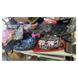 Large group of womanï¿½s purses and wallets