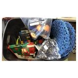 Tote with miscellaneous toys , bowls flashlight