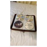 CDs in a leather book
