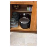 Group of kitchen pots with lids and storage