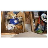 3 drawers of magnifying glass, phone chargers and