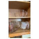 Pyrex  fire king measuring cups and more