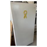 GE. Upright freezer approximately 28 .5 x 60 X