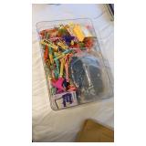 Little tote full of hair pins, curlers, & more