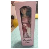 Porcelain doll NIB