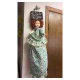 Plastic face doll bag holder