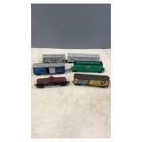 6 HO Scale Railway Cars. 4 Box Cars, 1 Hopper, &