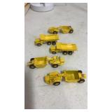 1:64 scale yellow  die cast dump trucks and more