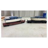 2. HO SCALE Athearn  flat car with. Boat
