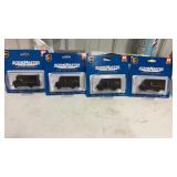 4 new in pkg scene master UPS trucks. HO scale