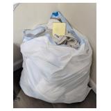 TRASH BAG FULL OF HAND TOWELS