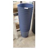 LARGE STACK OF WASTE BASKETS