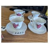 (4) TEA AND SAUCERS