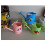4 WATERING CANS