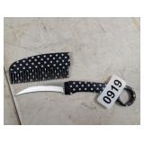 BLACK AND WHITE COMB KNIFE