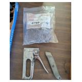 TILE SPACERS, STANLET STAPLER AND BOX CUTTER