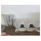 LETTER M AND CANDLE HOLDERS
